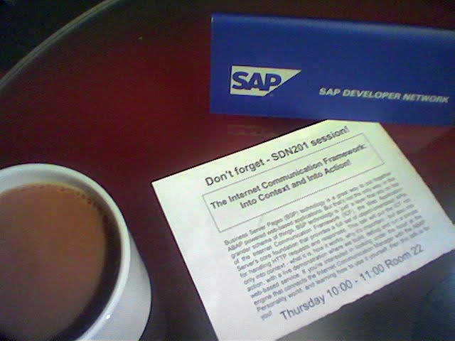 session flyer on the table next to a cup of coffee