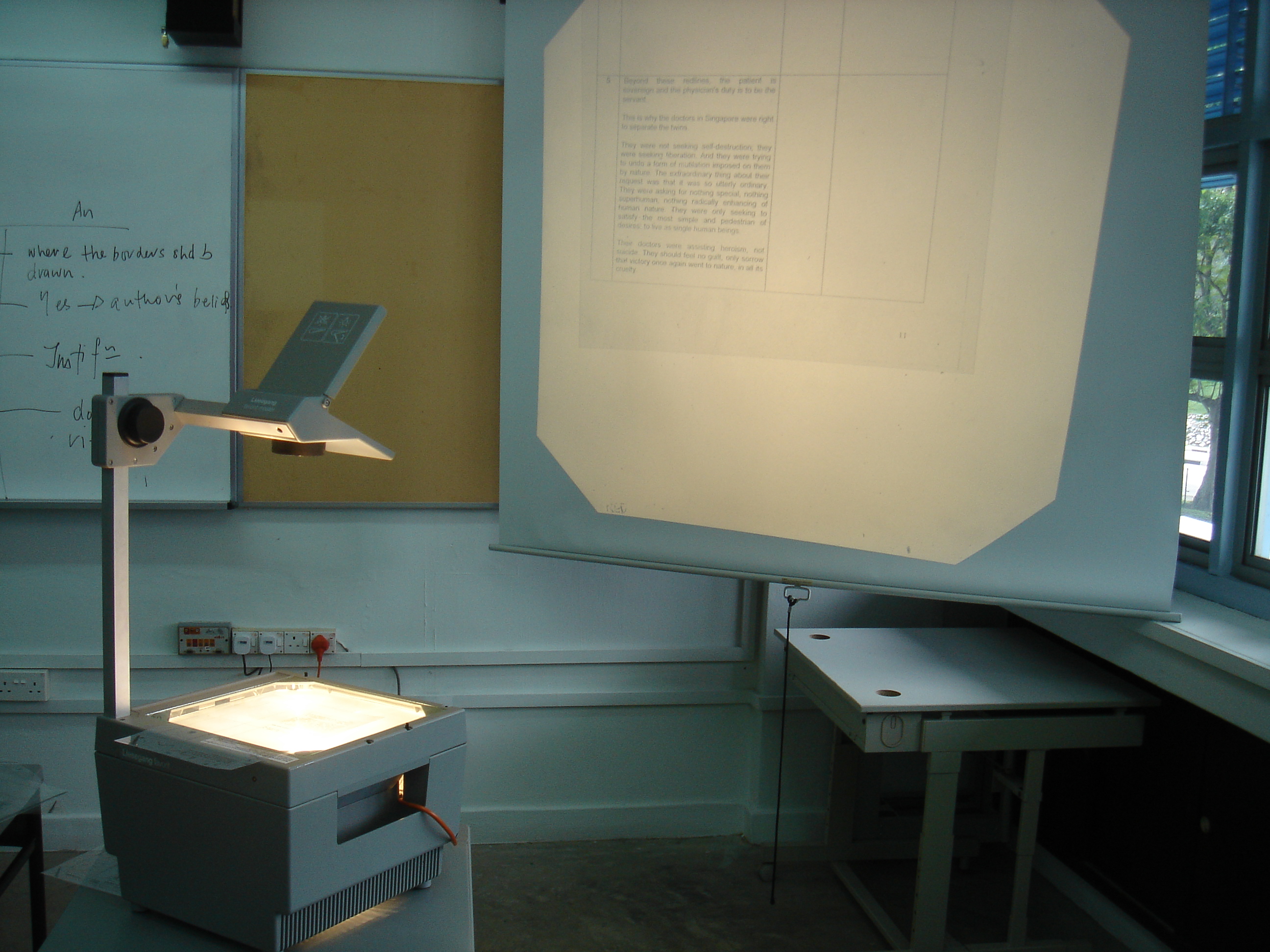 An overhead projector and screen